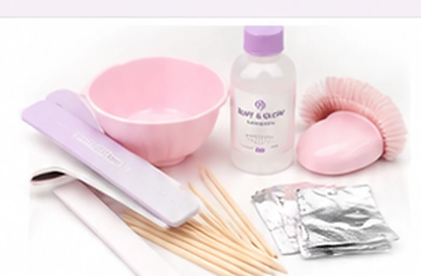 Pink nail aftercare kit including a bowl, nail files, foil wraps, sticks and other nail care tools