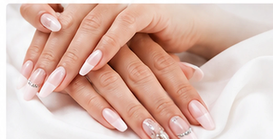 Elegant pink and white nail extensions with delicate details